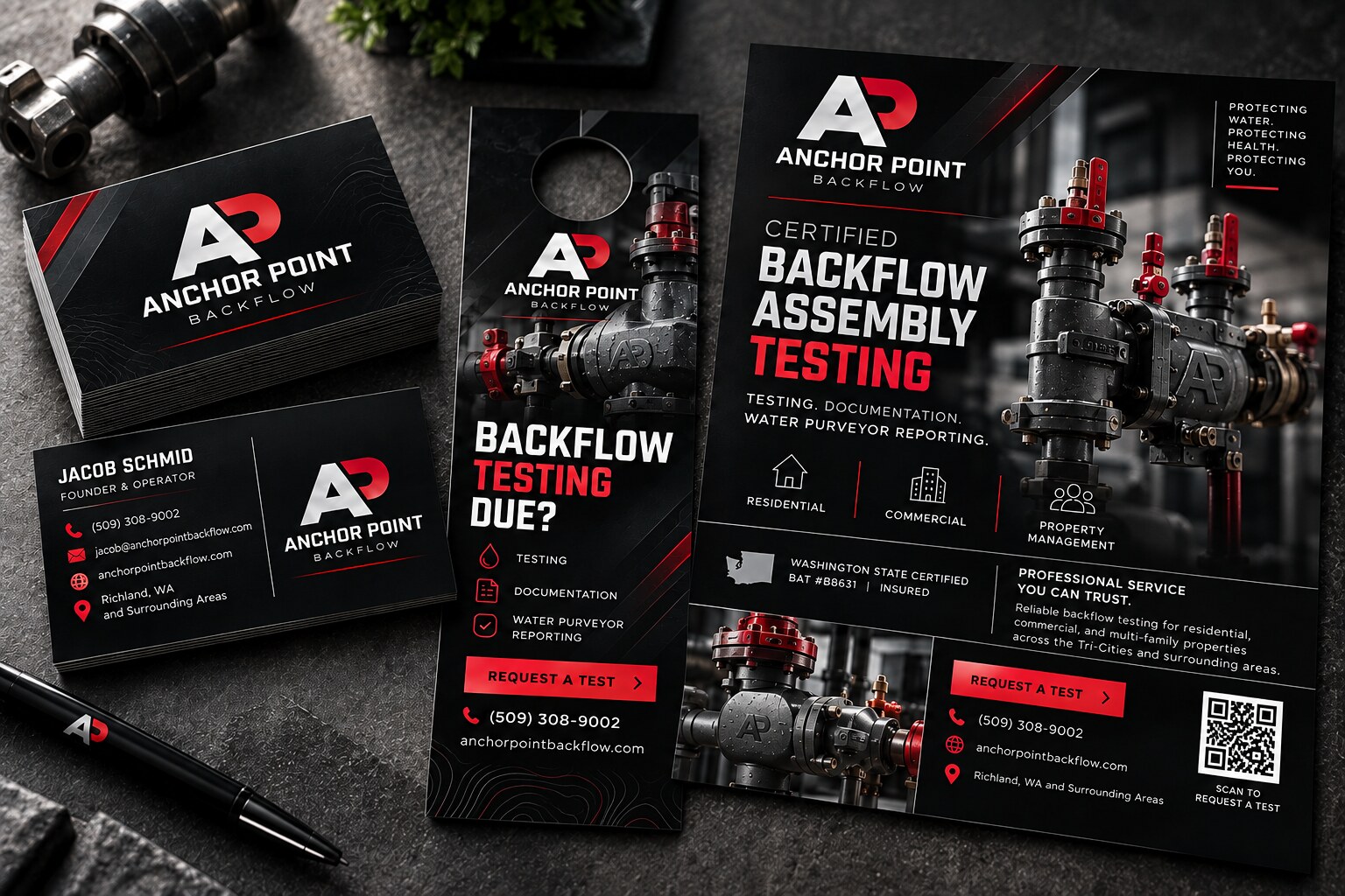 Anchor Point Backflow business cards, door hanger and promotional flyer in black, white, grey and red